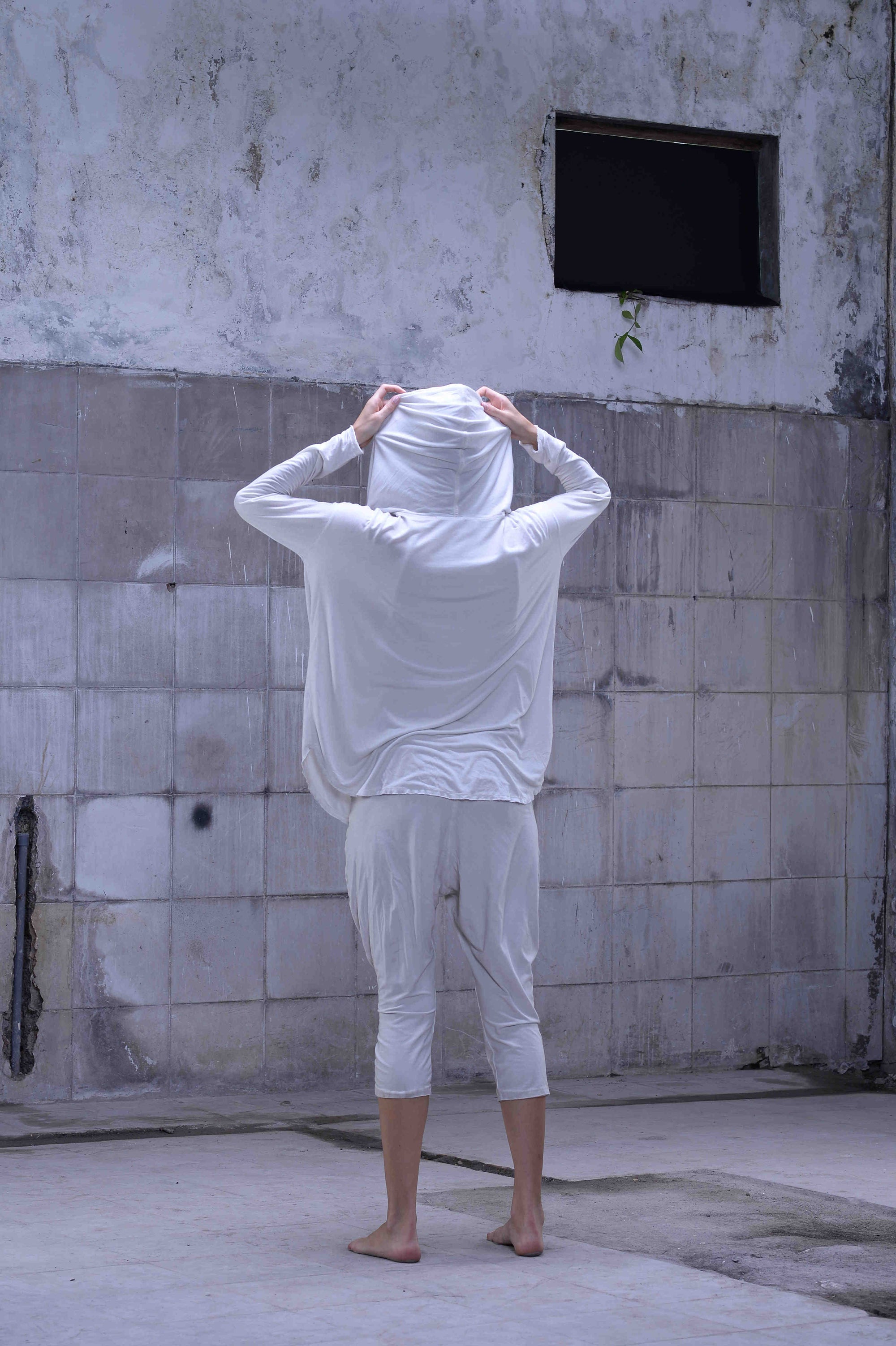 Jersey over draped sweater