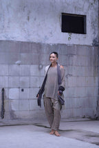Knitted over draped sweater