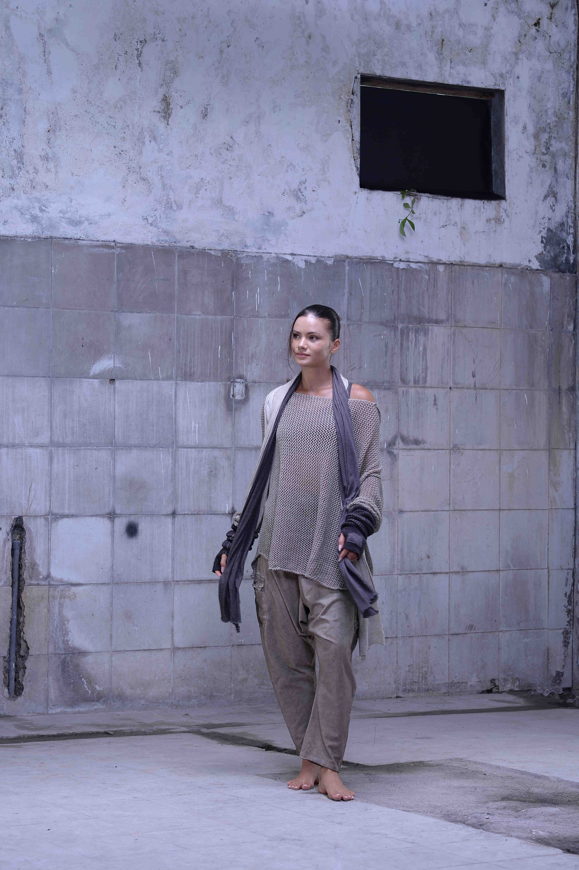 Knitted over draped sweater
