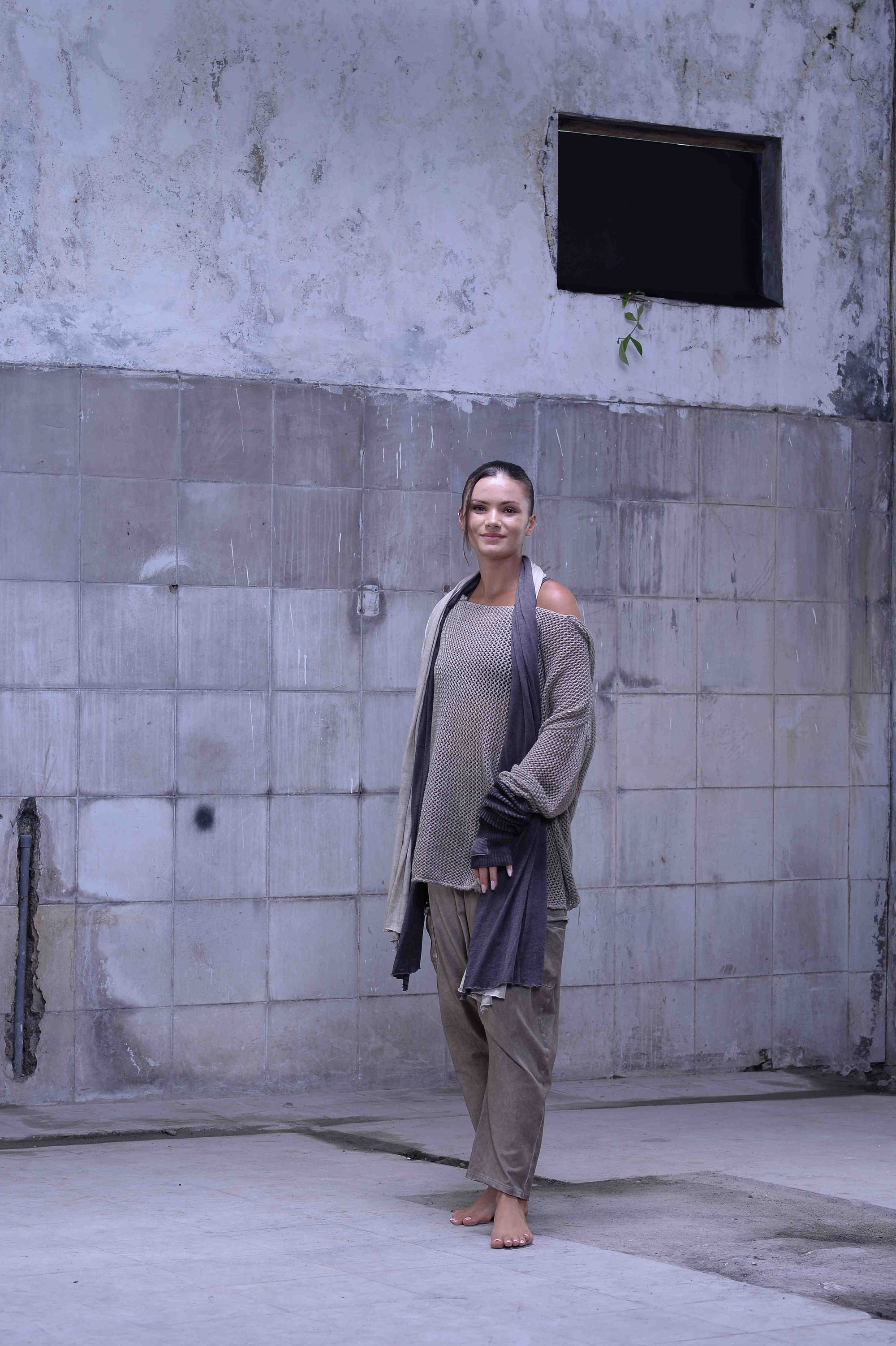 Knitted over draped sweater