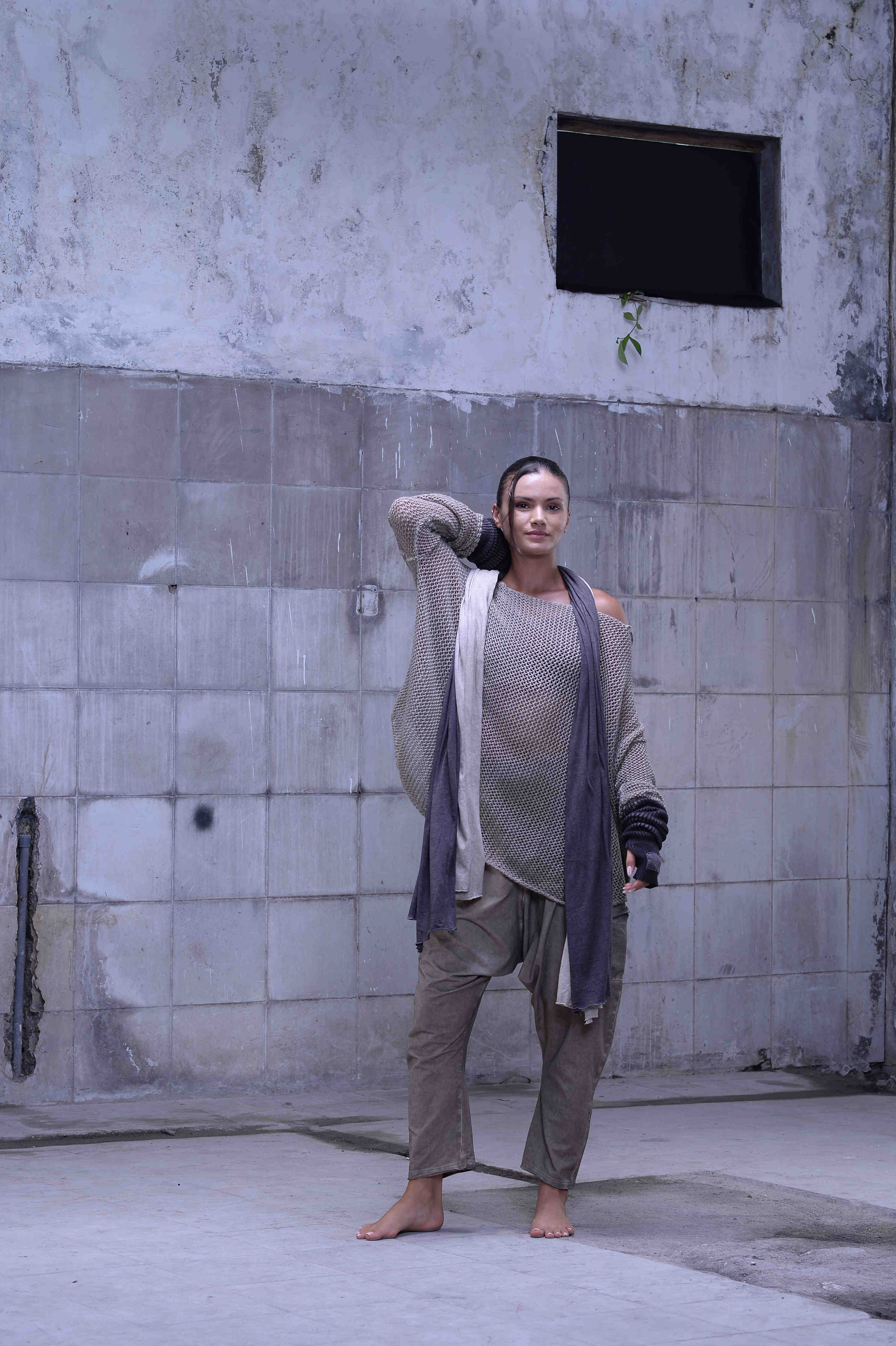 Knitted over draped sweater