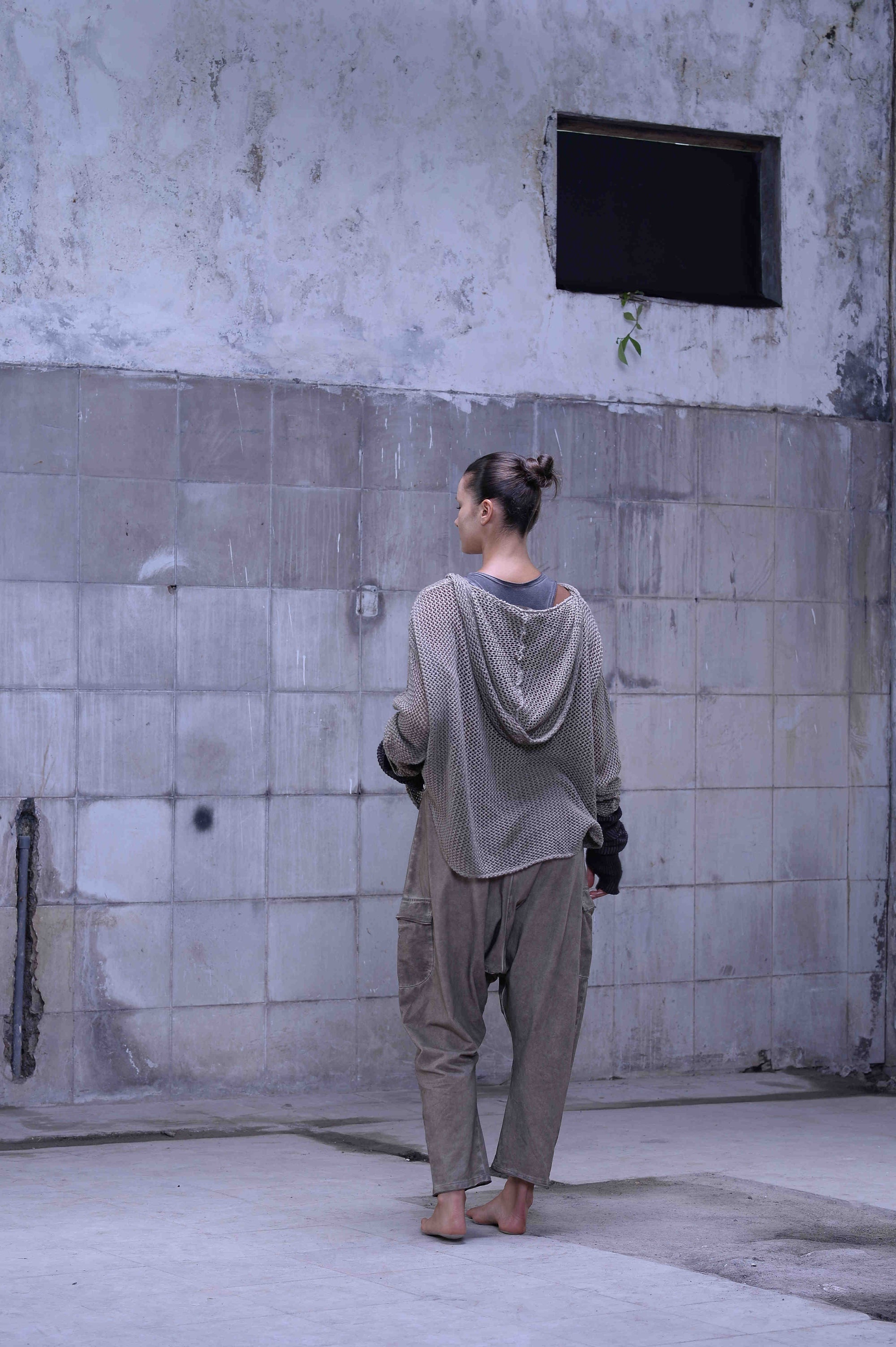 Knitted over draped sweater