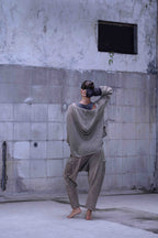 Knitted over draped sweater