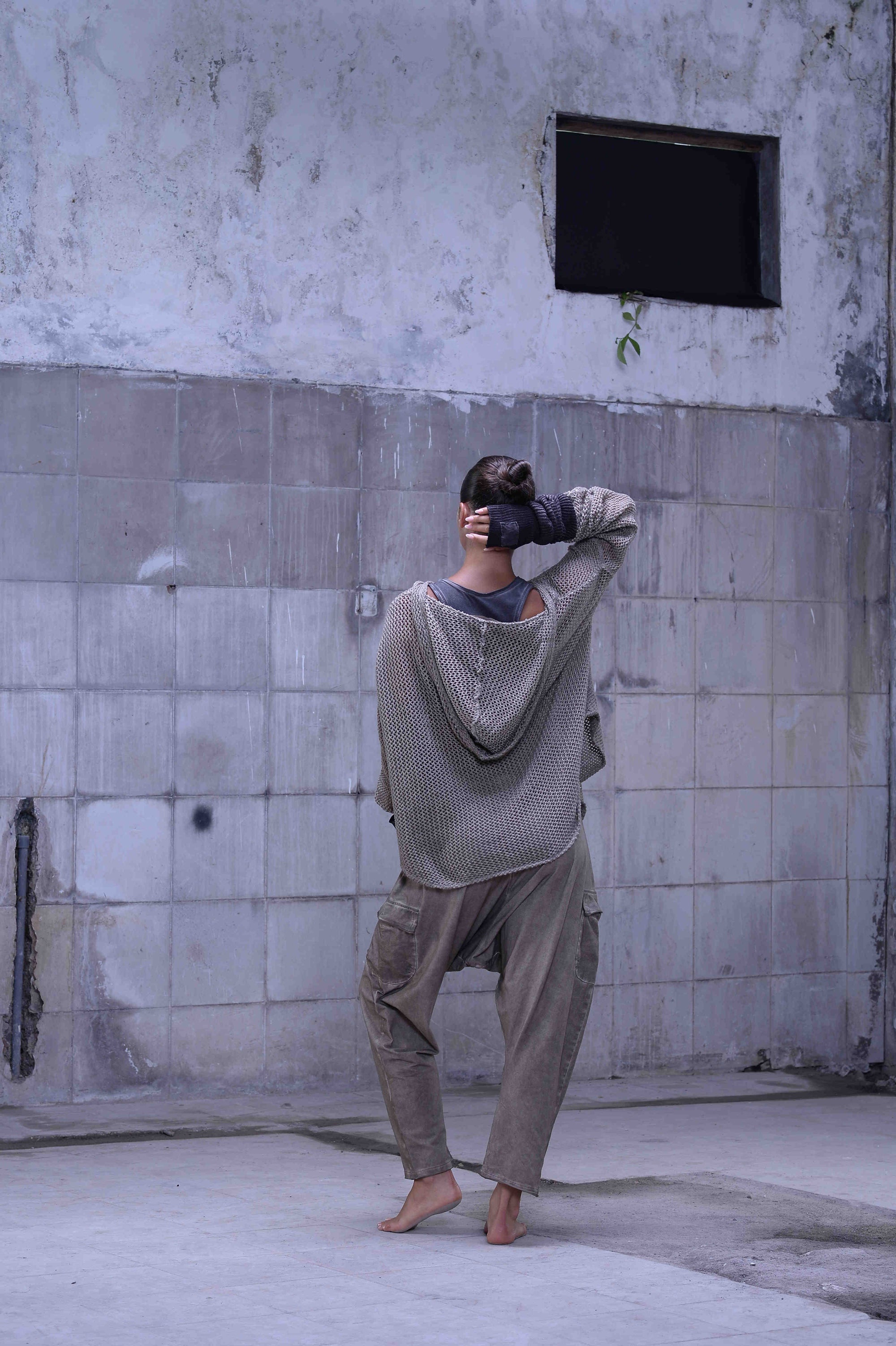 Knitted over draped sweater