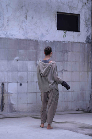 Knitted over draped sweater