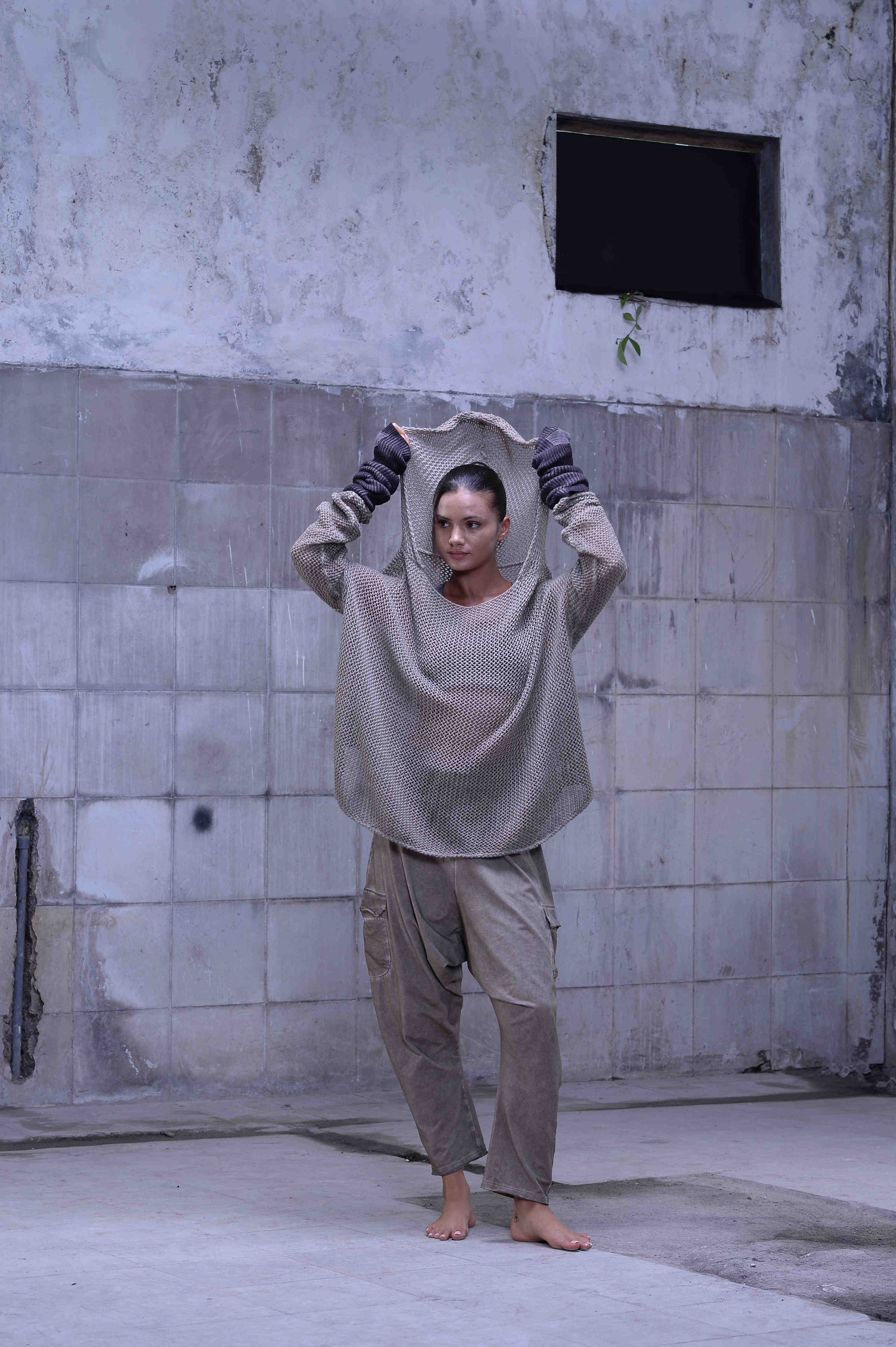 Knitted over draped sweater