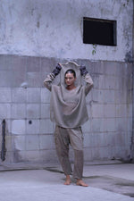 Knitted over draped sweater