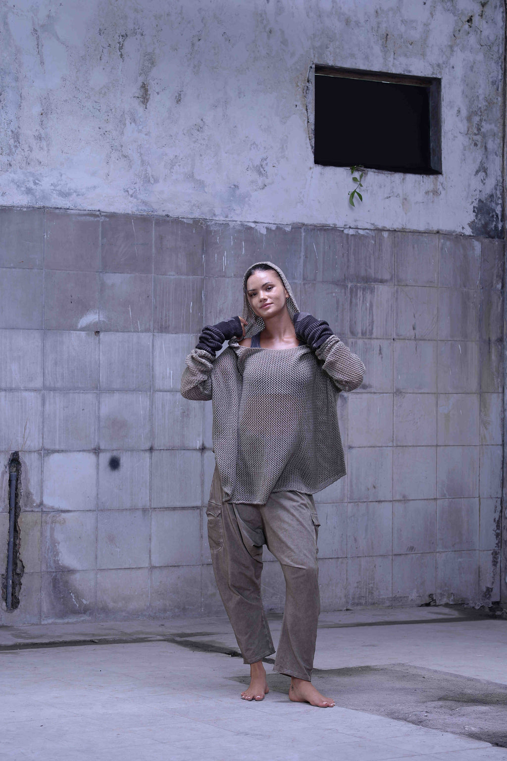 Knitted over draped sweater