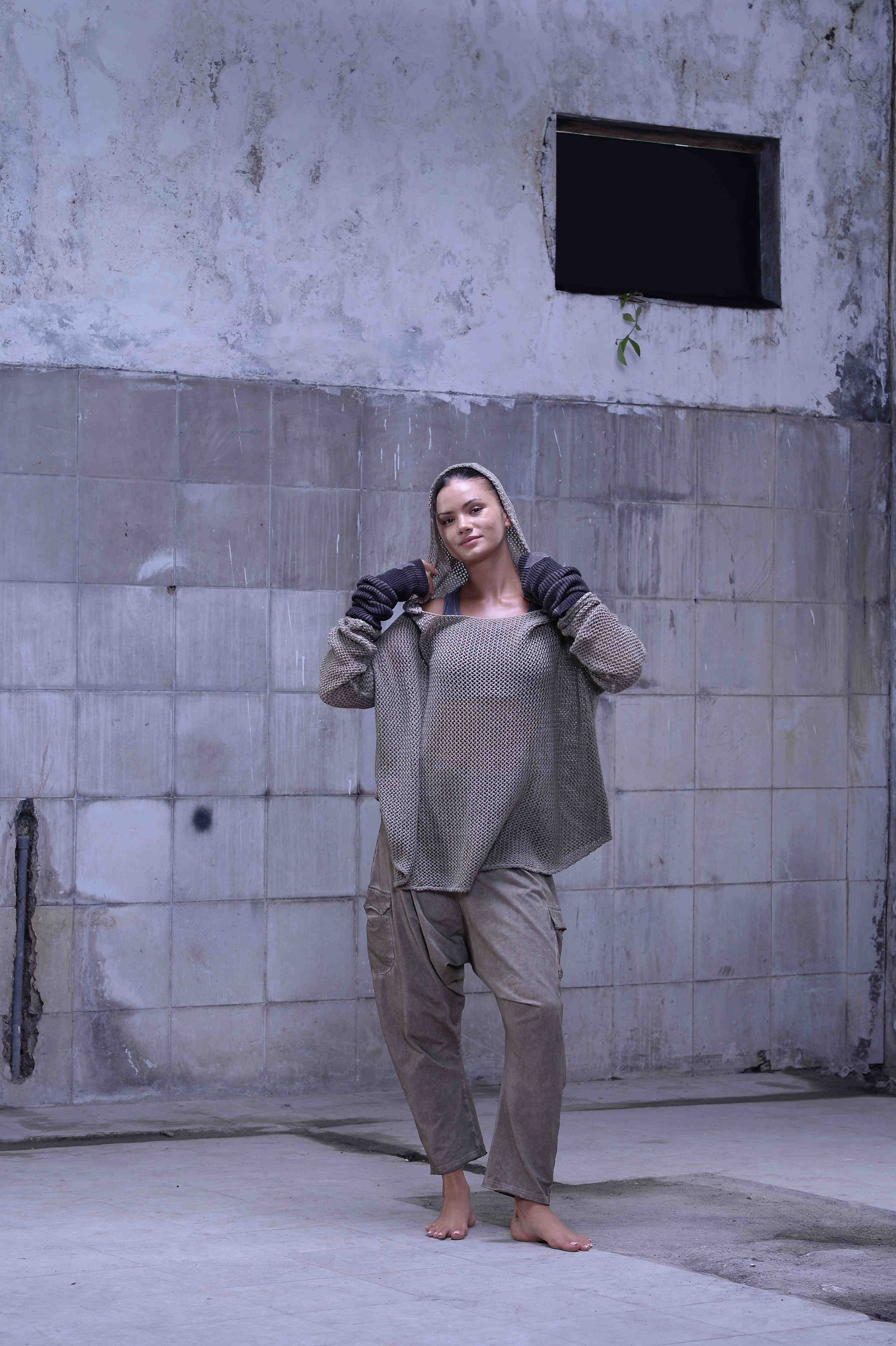 Knitted over draped sweater