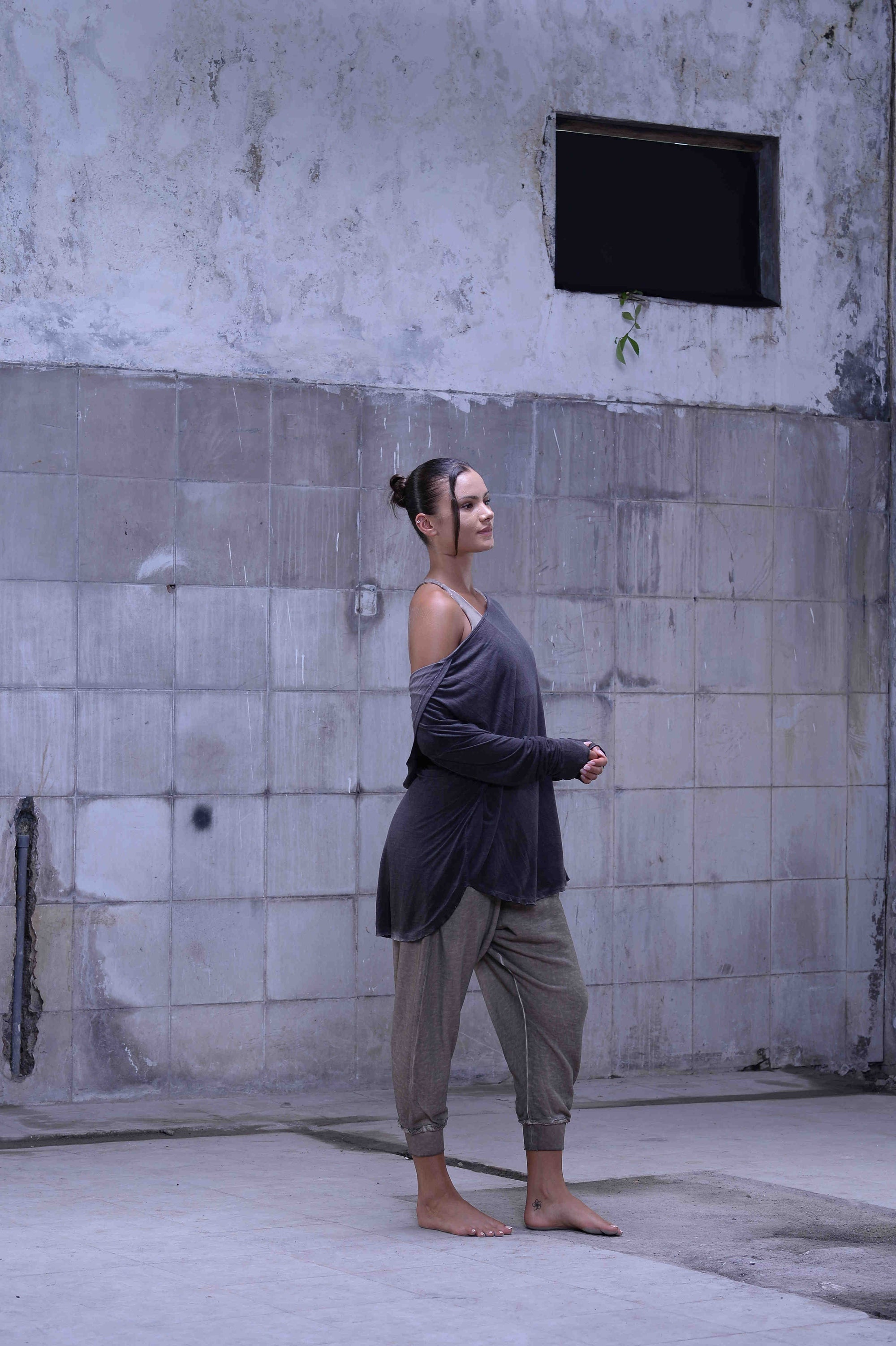 Jersey over draped sweater