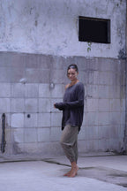 Jersey over draped sweater