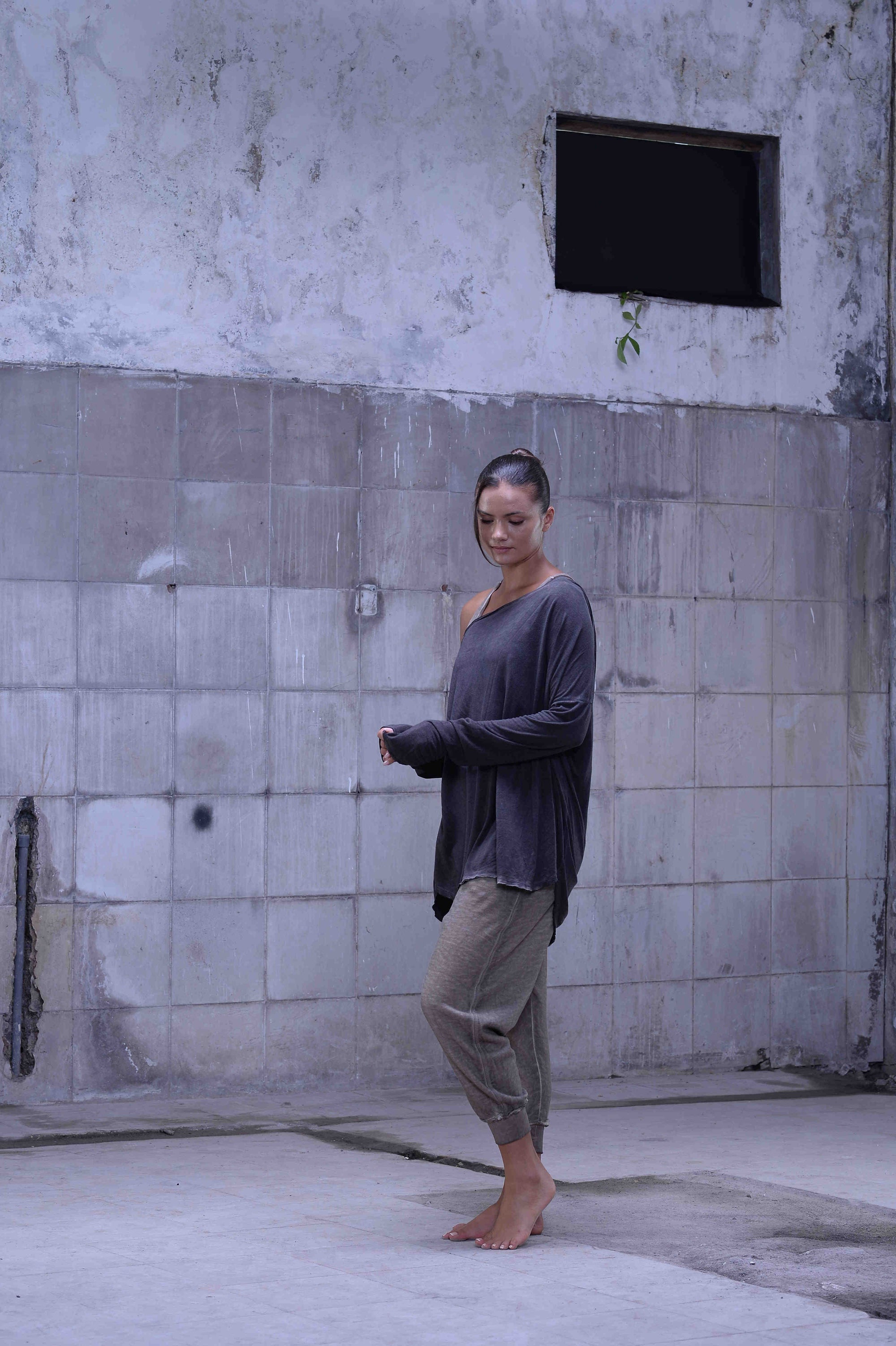 Jersey over draped sweater