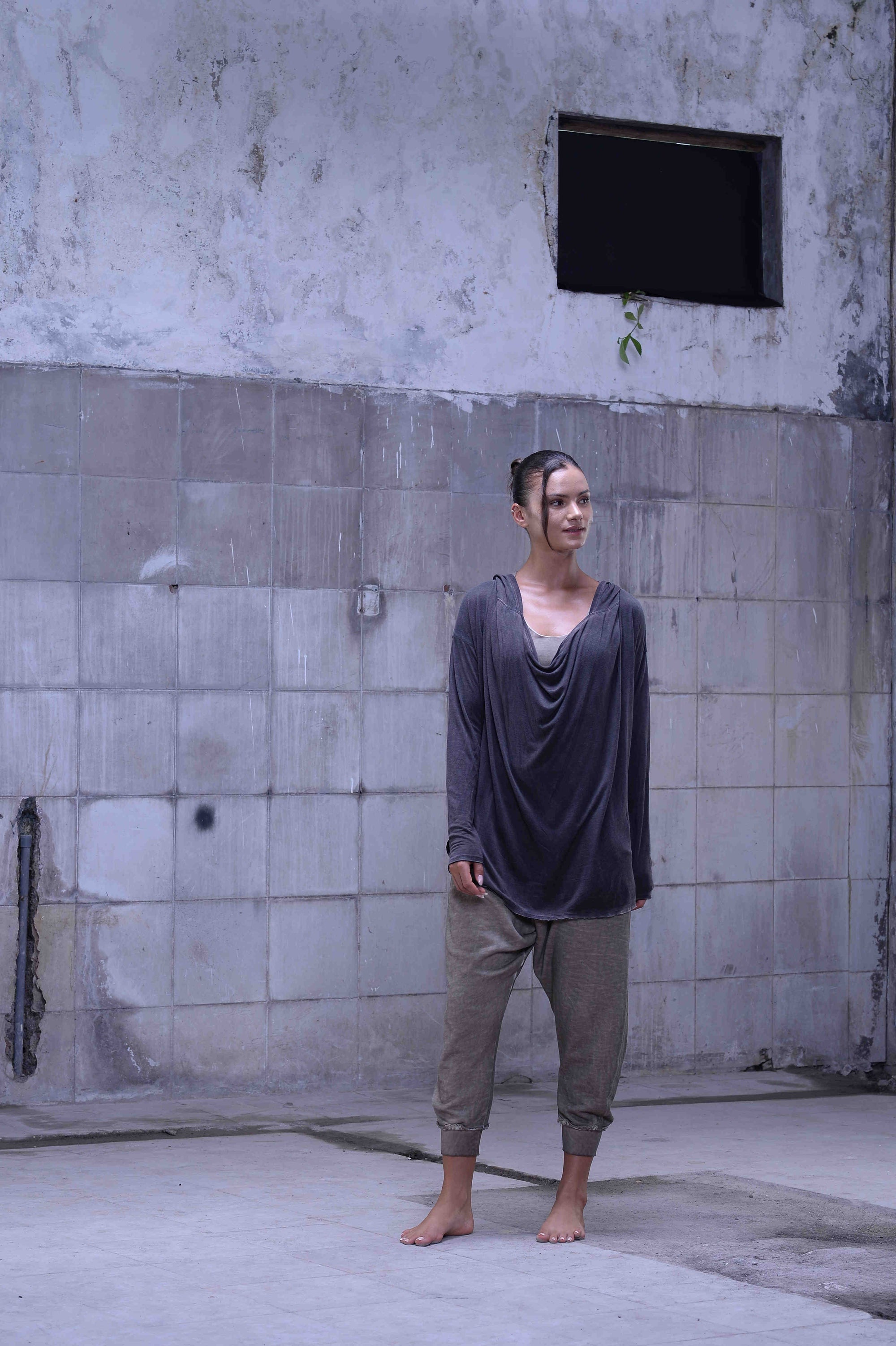 Jersey over draped sweater
