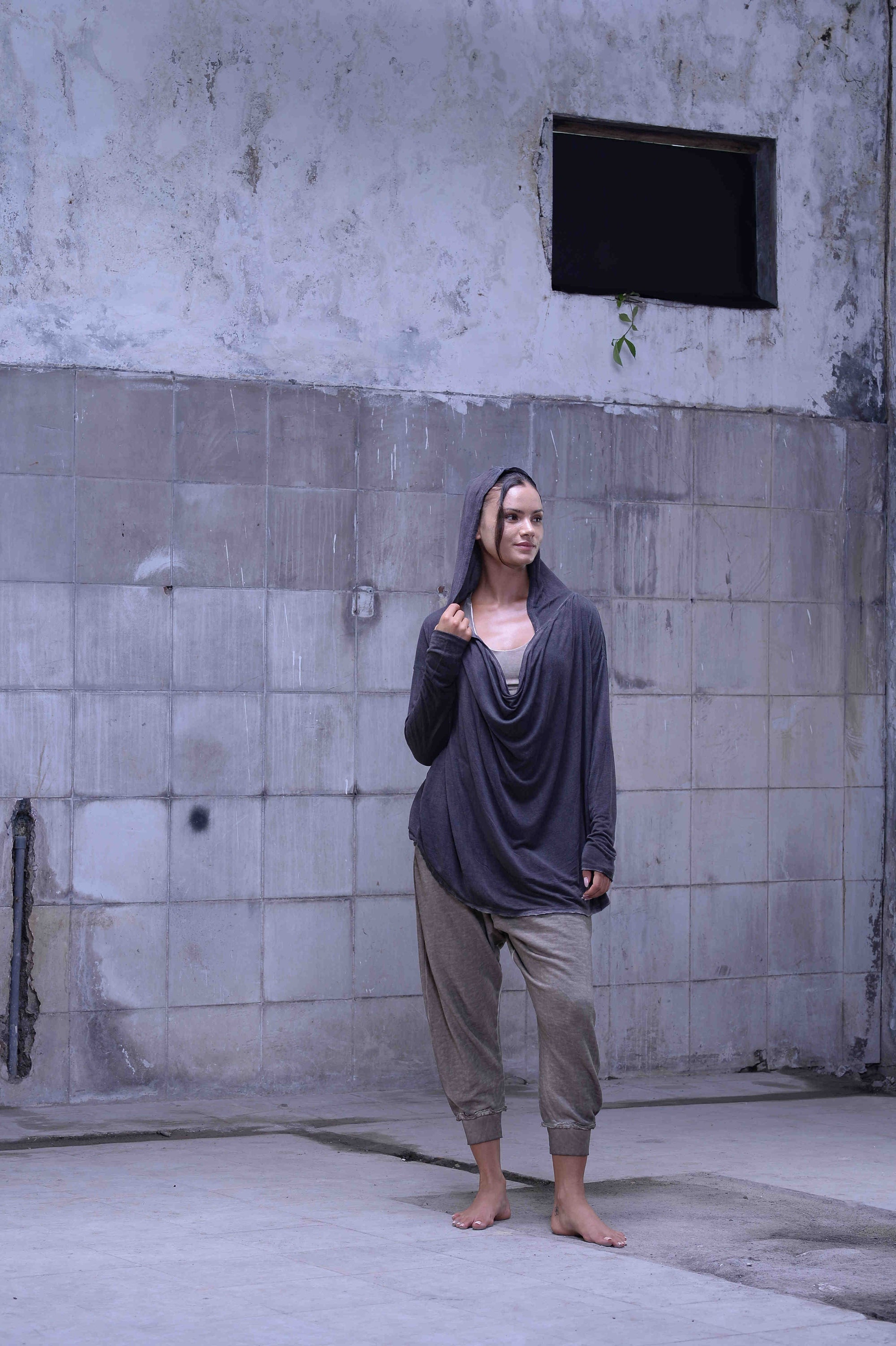 Jersey over draped sweater