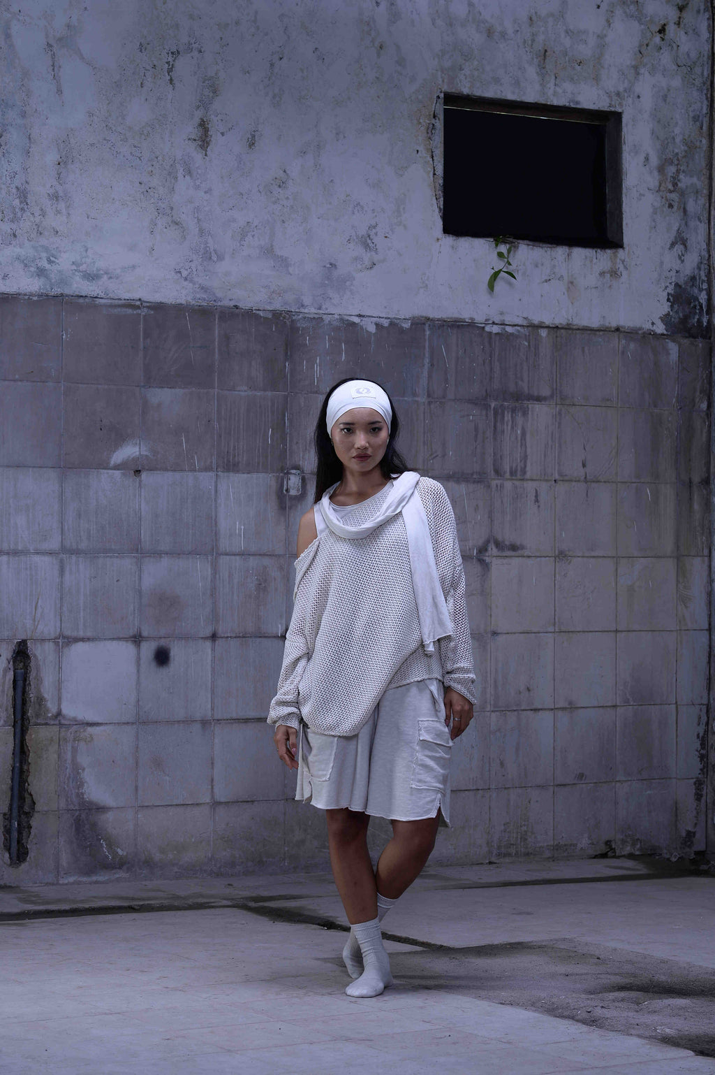 Knitted over draped sweater