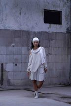 Knitted over draped sweater