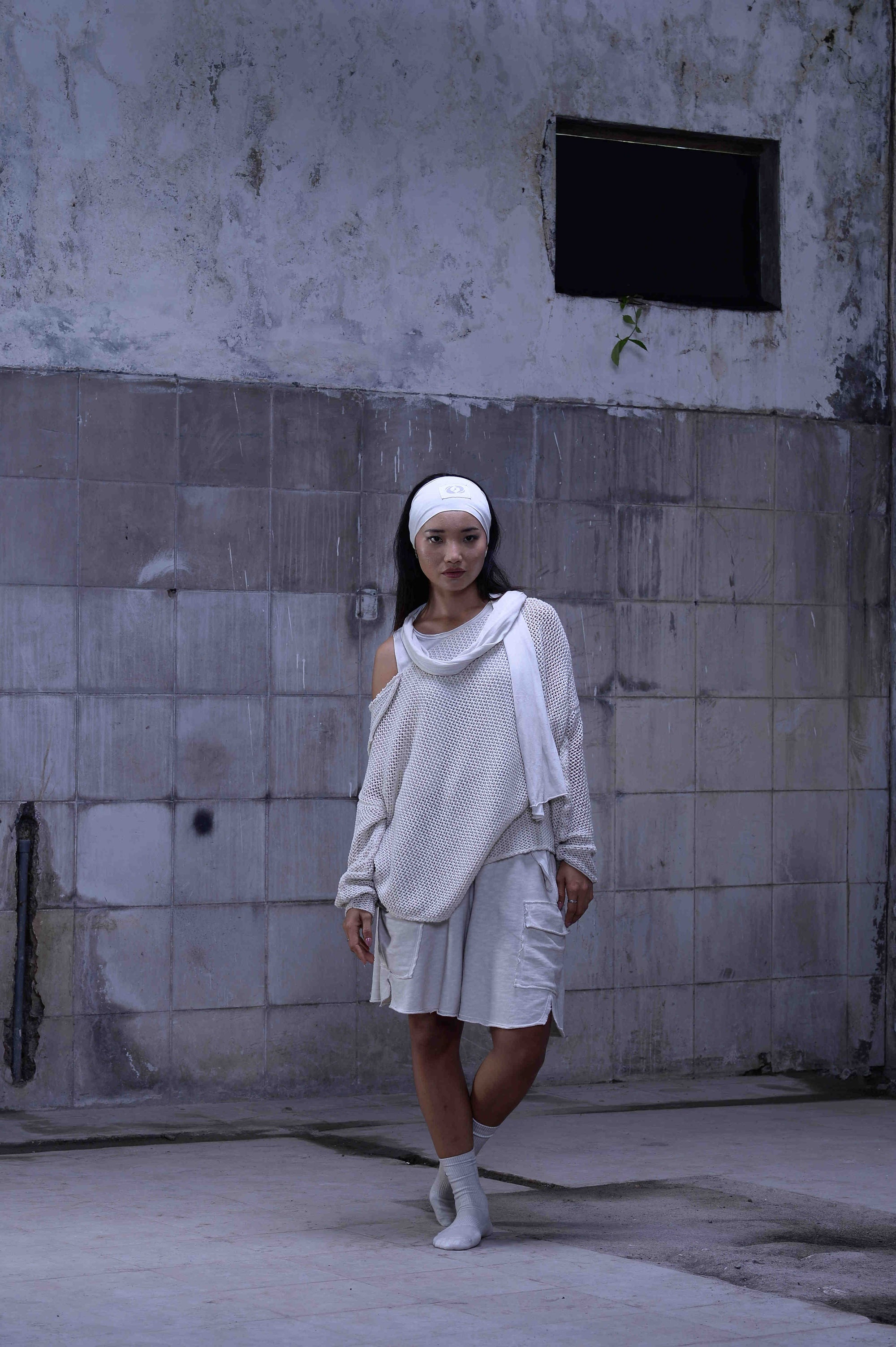 Knitted over draped sweater