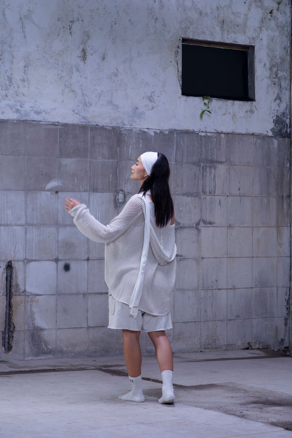 Knitted over draped sweater