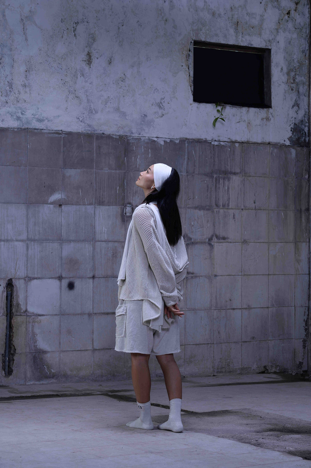 Knitted over draped sweater