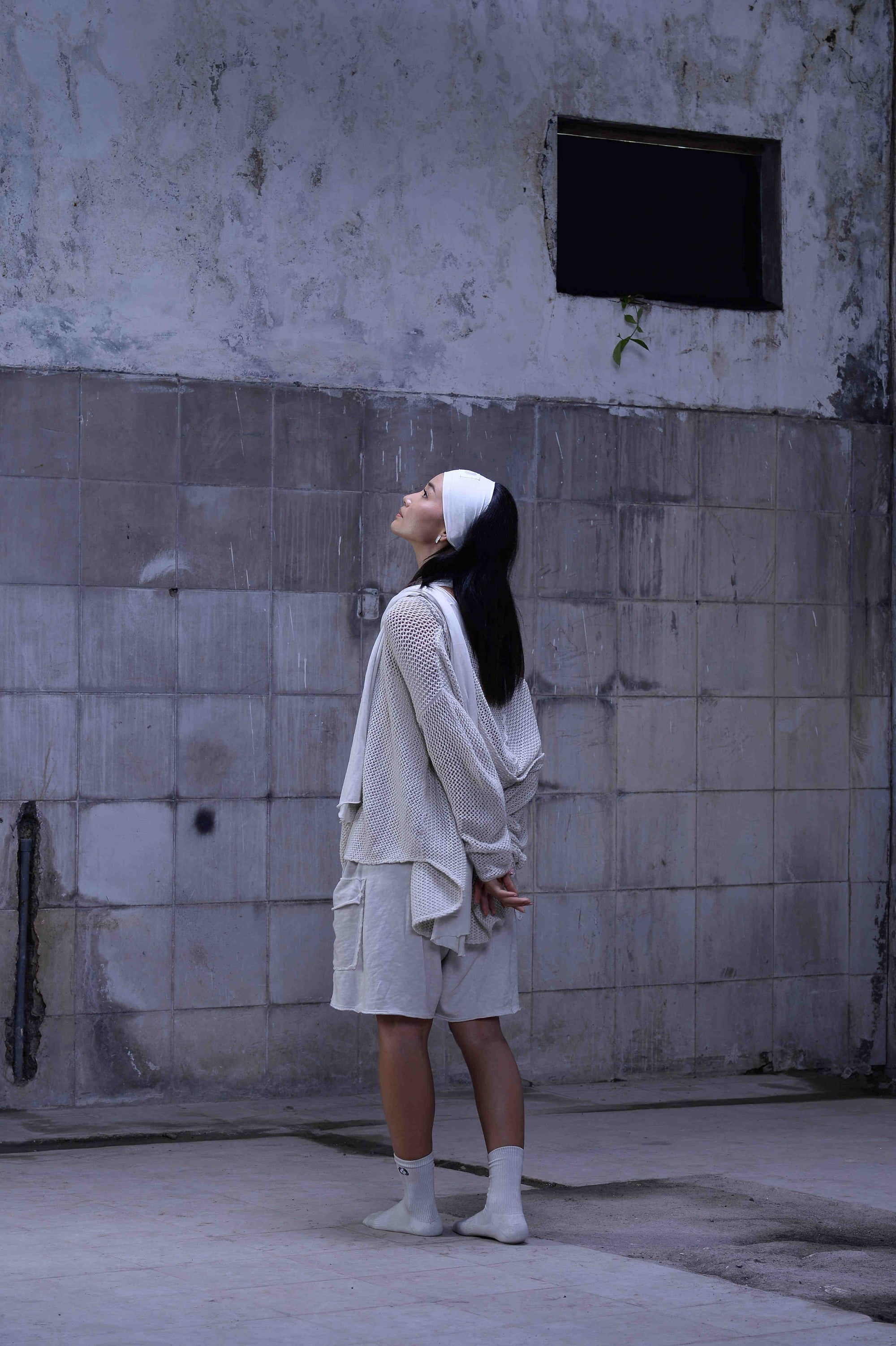Knitted over draped sweater