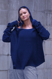 Knitted over draped sweater