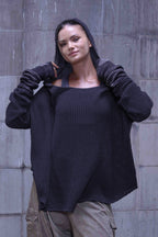 Knitted over draped sweater