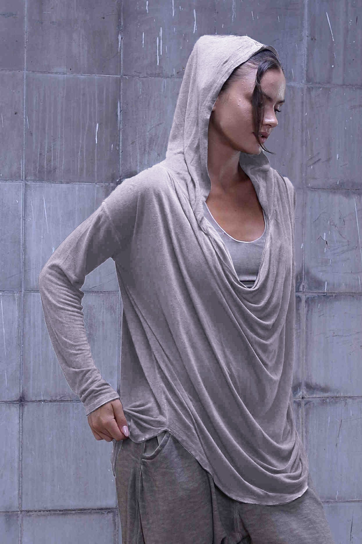 Jersey over draped sweater